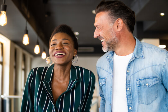 Two colleagues smiling