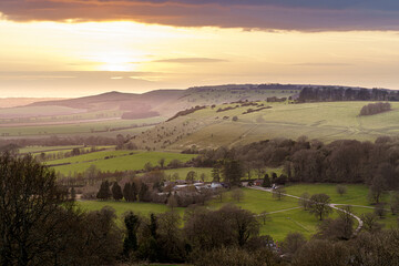 scenic Westerly view over as the golden sun sets over Oare and across the Pewsey Vale valley