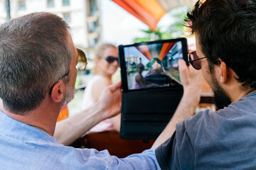 Friends sightseeing Bangkok by boat