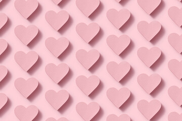 Papercraft pastel pink hearts pattern with shadows.