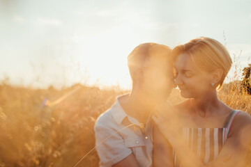Golden hour portrait of lovers couple