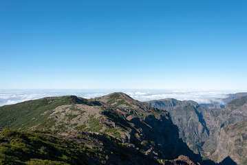 Fototapeta na wymiar View from Pico do Arieiro above the clouds. Typical landscape of Madeira Island. 
