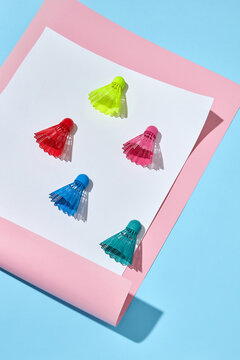 Sport pattern from colorful badminton shuttlecocks.