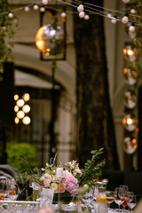 celebration table decoration with flowers candles fruits at the restaurant