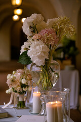 celebration table decoration with flowers candles fruits at the restaurant