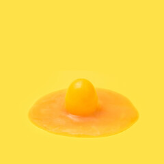 Slime over egg shell toy concept. Illuminating yellow background