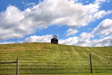 Bush Hogging Field in Tennessee © Bonita