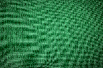 Texture of green natural linen fabric. Used like background.