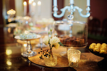 celebration table decoration with flowers candles fruits at the restaurant