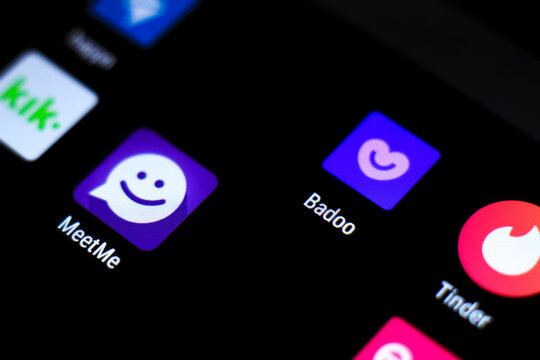 Dating app icons on black screen