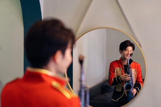 Saxophone player in the room