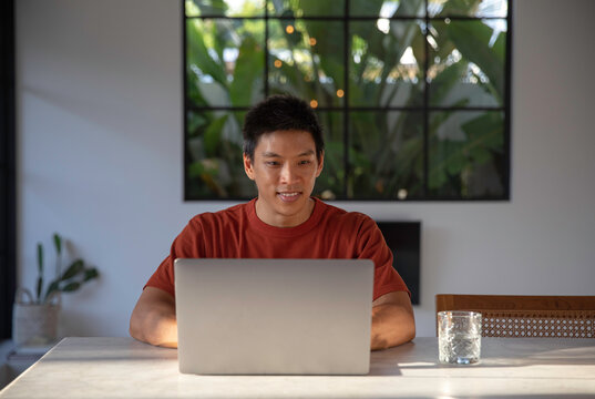 Asian man working from home