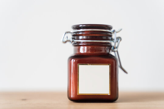 Scented Candle In A Glass Jar On A White Background