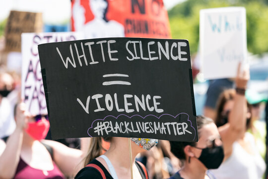 BLM: Protest Signs Says White Silence Equals Violence