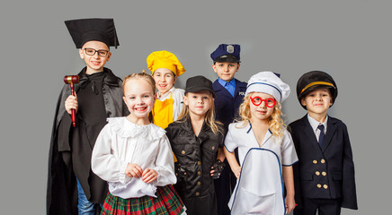 Group of children dressed in costumes of different professions