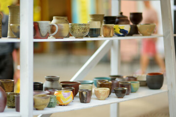 Ceramic dishes, tableware and jugs sold on Easter market in Vilnius