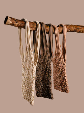 Eco bags hanging on stick