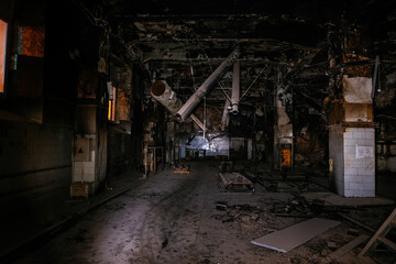 Burnt interior of industrial building or warehouse. Consequences of fire