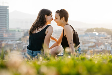 Lesbian couple having a relaxing time at the park