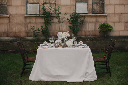 Wedding reception tablescape with desert and champagne
