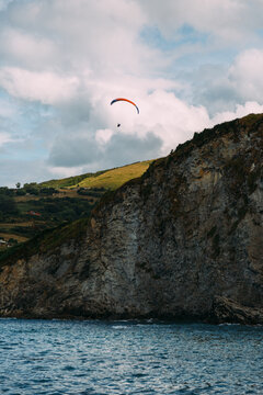 Paraglider over the cliffs of Laredo
