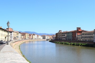 Obraz premium Landscape with Pisa old town and Arno river, Tuscany, Italy