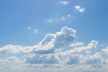 Sunny day with clouds. Predominance of bluish tones. concept of sunny day with some clouds conveying calm.