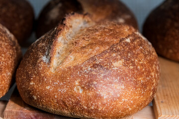 Craft bread on the table at the bakery. The concept of small industries and healthy food