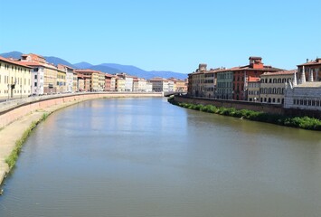 Fototapeta na wymiar Landscape with Pisa old town and Arno river, Tuscany, Italy