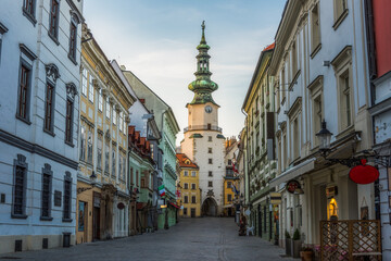 Empty Michalska Street in Bratislava Old Town During Coronavirus Pandemic with Michael's Tower (Michalska Brana) in Background in Slovakia - obrazy, fototapety, plakaty