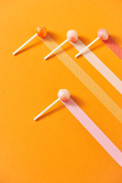 Lollipops on a orange background