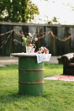 Rustic table with flowers on top