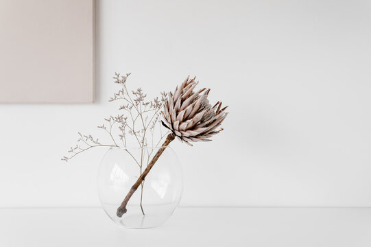 Dried Flowers In Vase On Table