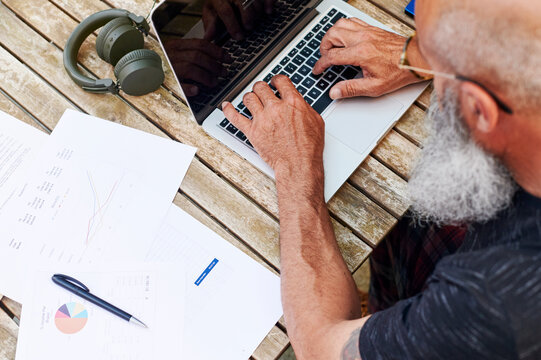 Mature man working online from home