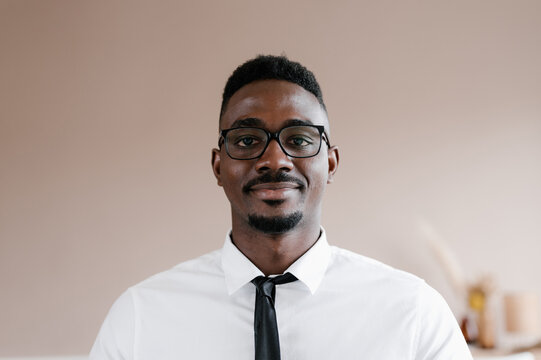 Positive ethnic man in office
