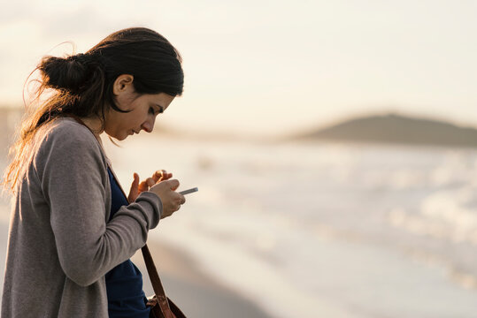 Woman checking her mobile