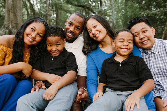 Happy Family Looking at Camera