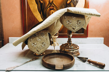 church utensils bowl and icons