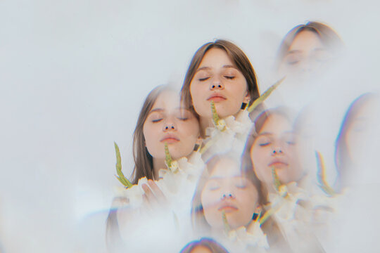 Multi exposure portrait with white gladioluses