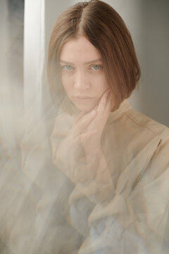 Woman behind abstract blur