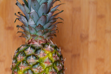 pineapple on wooden background