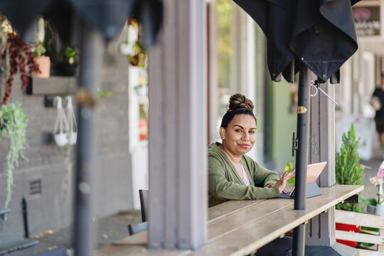 aboriginal woman in cafe