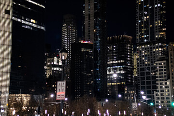 Fototapeta na wymiar New York City landscape with illuminated buildings. 