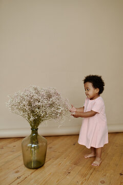 little girl playing and spending time at home