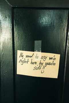 Note on the door ""no need to cry we're right here by you're side""