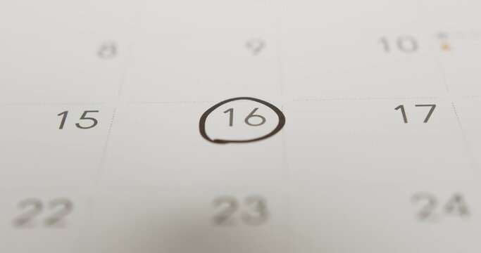 Calendar with a black circle on the date 16. Celebrate holidays, important events, dates, etc.