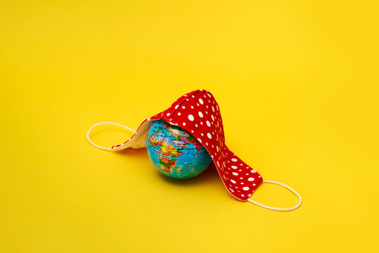 face mask and world globe