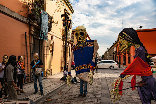 Lively Street Performers with Paper Mache Masks