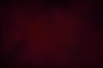 Texture for artwork and photography. Abstract maroon red stained paper texture background or backdrop.