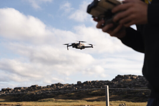 Man flying a drone